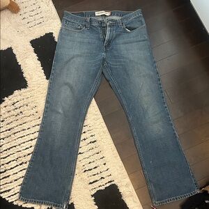 Levi's Denim Low-Rise Boot Cut Jeans in Medium Blue